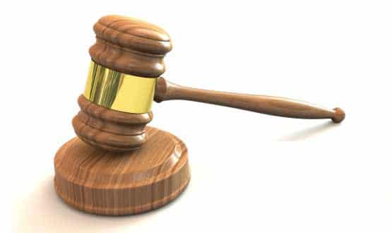 Former IT director pleads guilty to corruption