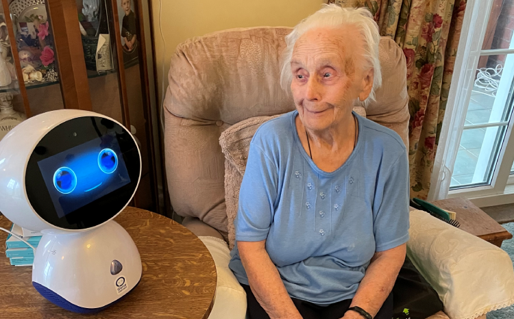 91-year-old Margaret at home with GenieConnect robot