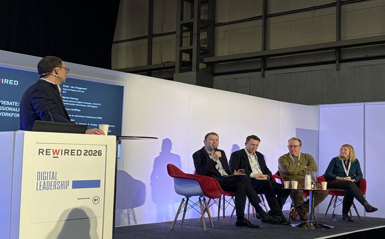L to R: - Martin Dennys, deputy director for digital profession, NHSE - Andrew Griffiths, chief executive, FEDIP - Neil Morgan, director of advocacy and strategy, AphA - Will Smart, chair, BCS Faculty for Health and Care - Jan Hoogewerf, head of health and care, BCS on stage at Rewired