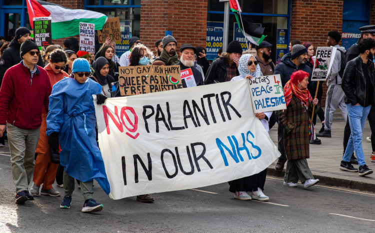 A protest march in 2025, protesting against Palantir's involvement in the NHS